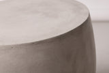 Close-up of the smooth light grey MGO lightweight concrete at the top edge of the Racalmuto side table