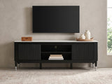 Ragusa Stone Top Media Console styled with a box, a tray of vases and books under a wall-mounted screen