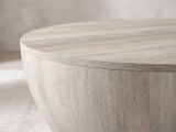 Close-up of the Rapallo Whitewashed Mango Bowl Coffee Table: the curved whitewashed mango body under the round top