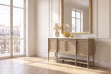 Rombiolo 68-Inch 4-Door Cane and Wood Sideboard with Cement Top in a Paris salon