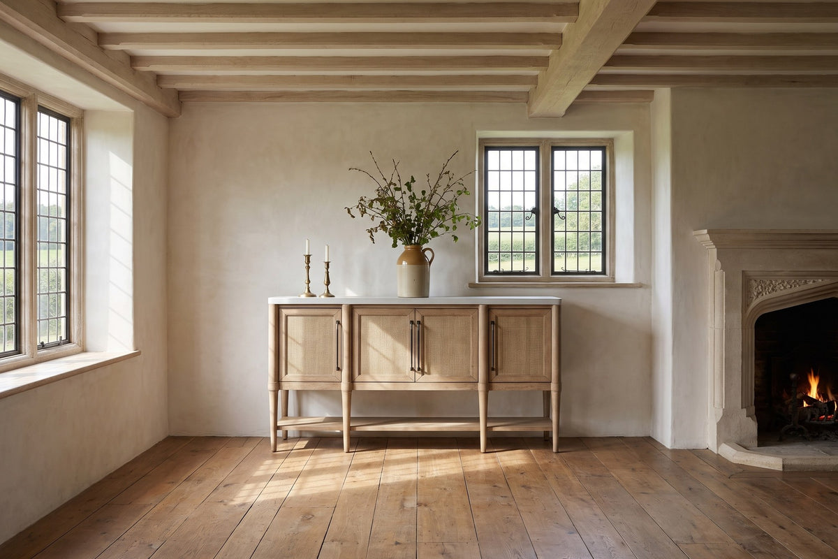 Rombiolo 68-Inch 4-Door Cane and Wood Sideboard with Cement Top in an English country dining room