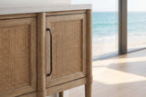 Close-up of the Rombiolo 68-Inch 4-Door Cane and Wood Sideboard with Cement Top: cane pull