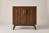 The Ruvo accent cabinet in a walnut finish, front view on a light studio backdrop