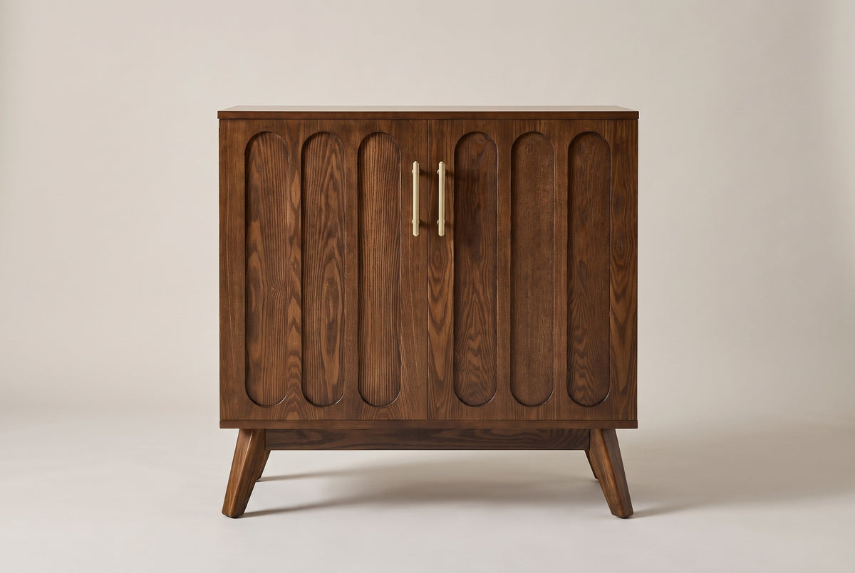 The Ruvo accent cabinet in a walnut finish, front view on a light studio backdrop