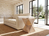 Santeramo Cerused Mango Faceted Side Table beside a linen sofa in a poolside villa