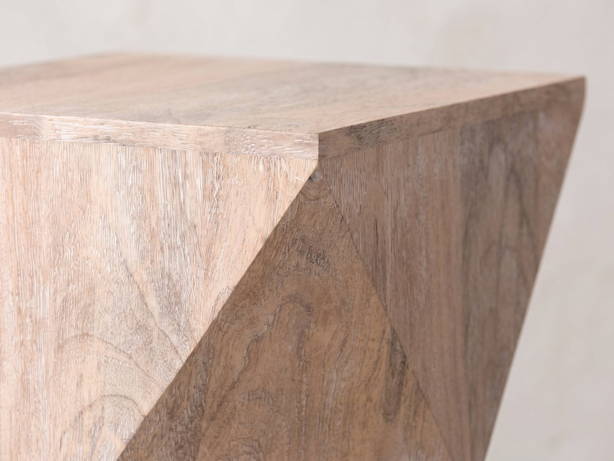 Close-up of the Santeramo Cerused Mango Faceted Side Table: the crisp top edge over the faceted mango sides