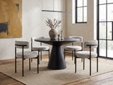 Savelli 47-Inch Round Black Oak Pedestal Dining Set with 4 Boucle Chairs in an industrial loft dining area