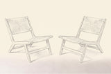 Pencil sketch of the two Scopello lounge chairs, three-quarter view from the front