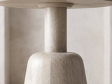 Close-up of the Segesta Whitewashed Mango Pedestal Side Table: the plain round column meeting the rounded shoulder of the cone base