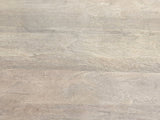 Close-up of the Segesta Whitewashed Mango Pedestal Side Table: the whitewashed mango grain of the top