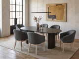 Seminara 80-Inch Oval Fluted Pedestal Dining Set with 6 Chairs in an industrial loft dining area