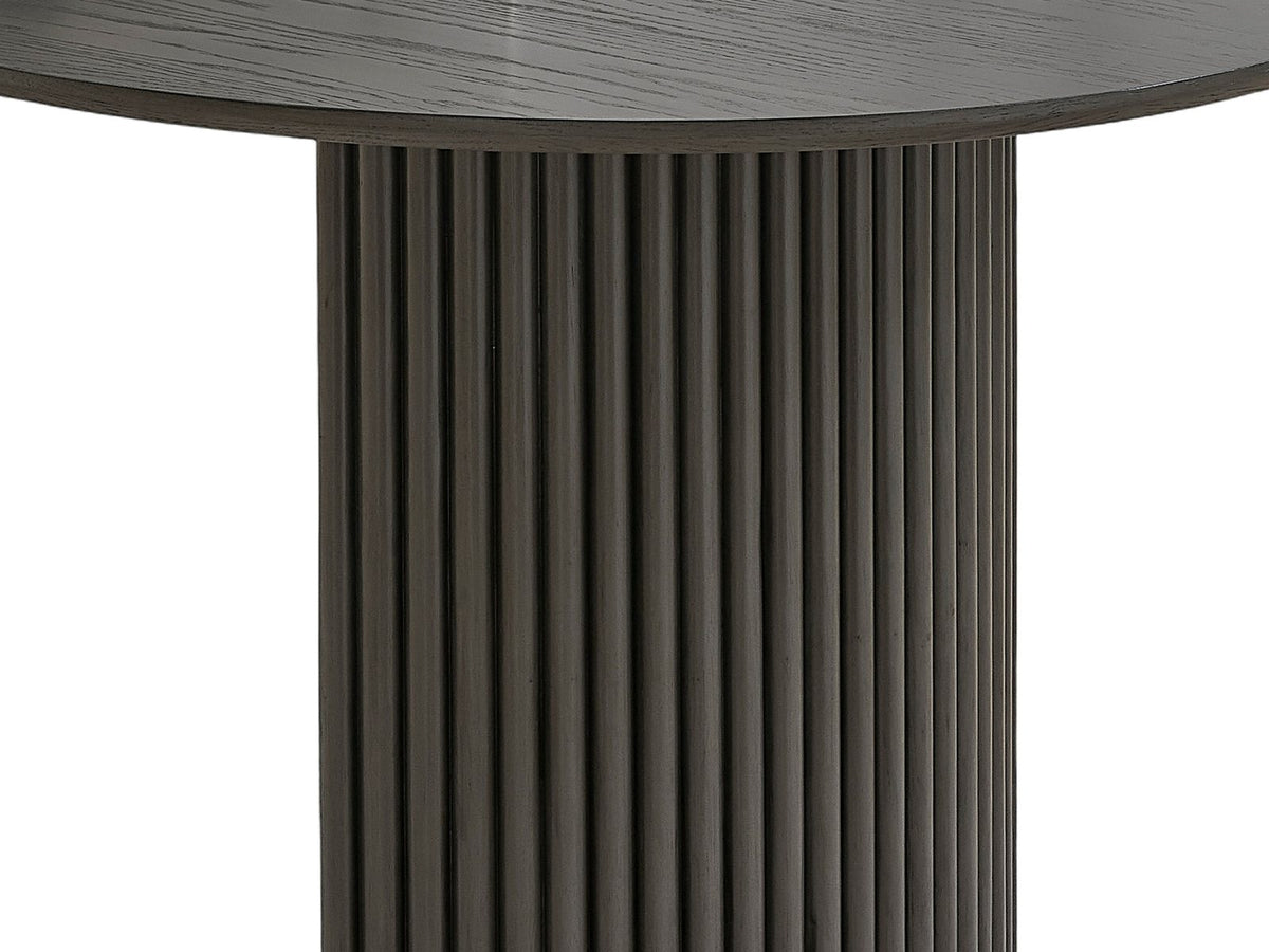 Close-up of the Seminara 80-Inch Oval Fluted Pedestal Dining Set with 6 Chairs: a half-round pedestal wrapped in rounded reeds under the slim grey oak veneer top
