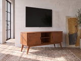 Senigallia Low Mid-Century Media Console seen from the side, under a screen showing a snowy landscape on a winter evening