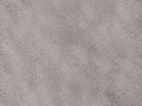 Close-up of the Sepino Antique Silver Metal Drum Side Table: the hammered antique silver finish of the top