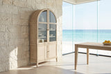 Serrastretta 42-Inch 4-Door Arched Oak Veneer Display Cabinet with Glass and Cane in an oceanfront glass house