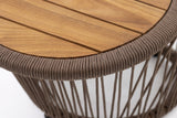 Close-up of the acacia slats in a natural teak finish and the dark beige coiled rope rim of the Siculiana side table