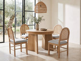 Siderno 42-Inch Extending Round Dining Set with 4 Chairs in a sunlit villa dining area with olive trees outside