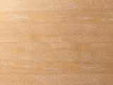 Close-up of the Siderno 42-Inch Extending Round Dining Set with 4 Chairs: the limed oak veneer top