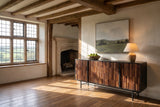 Simeri 68.5-Inch 4-Door Solid Sheesham and Mango Wood Sideboard with Iron Base in an English country dining room