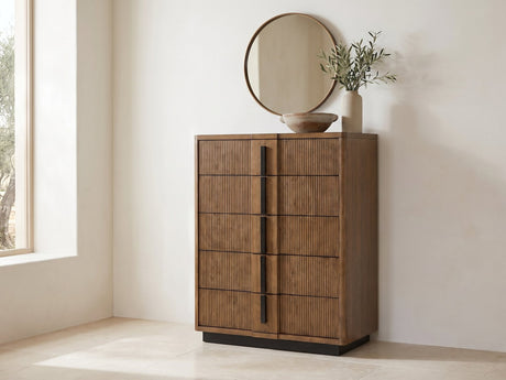 Soave 40-Inch Ash Brown Reeded 5-Drawer Chest under a round bronze mirror in a villa bedroom