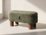 Sorrento Storage Bench in moss green against a plaster wall in morning light