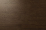 Close-up of the warm brown solid wood on the Sorso nightstand: fine grain and the joints between the wood staves