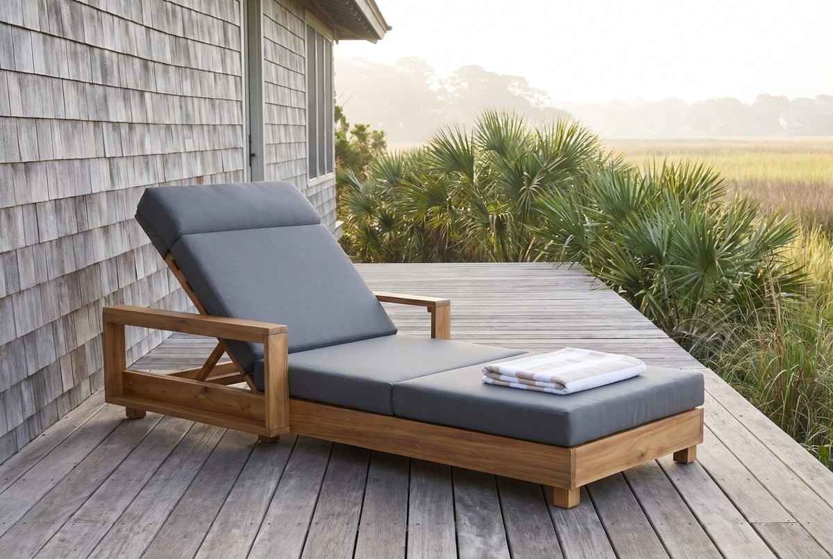 Sortino acacia chaise on a boardwalk deck beside a cedar-shingle beach house on Hilton Head Island, palmettos and marsh grass behind