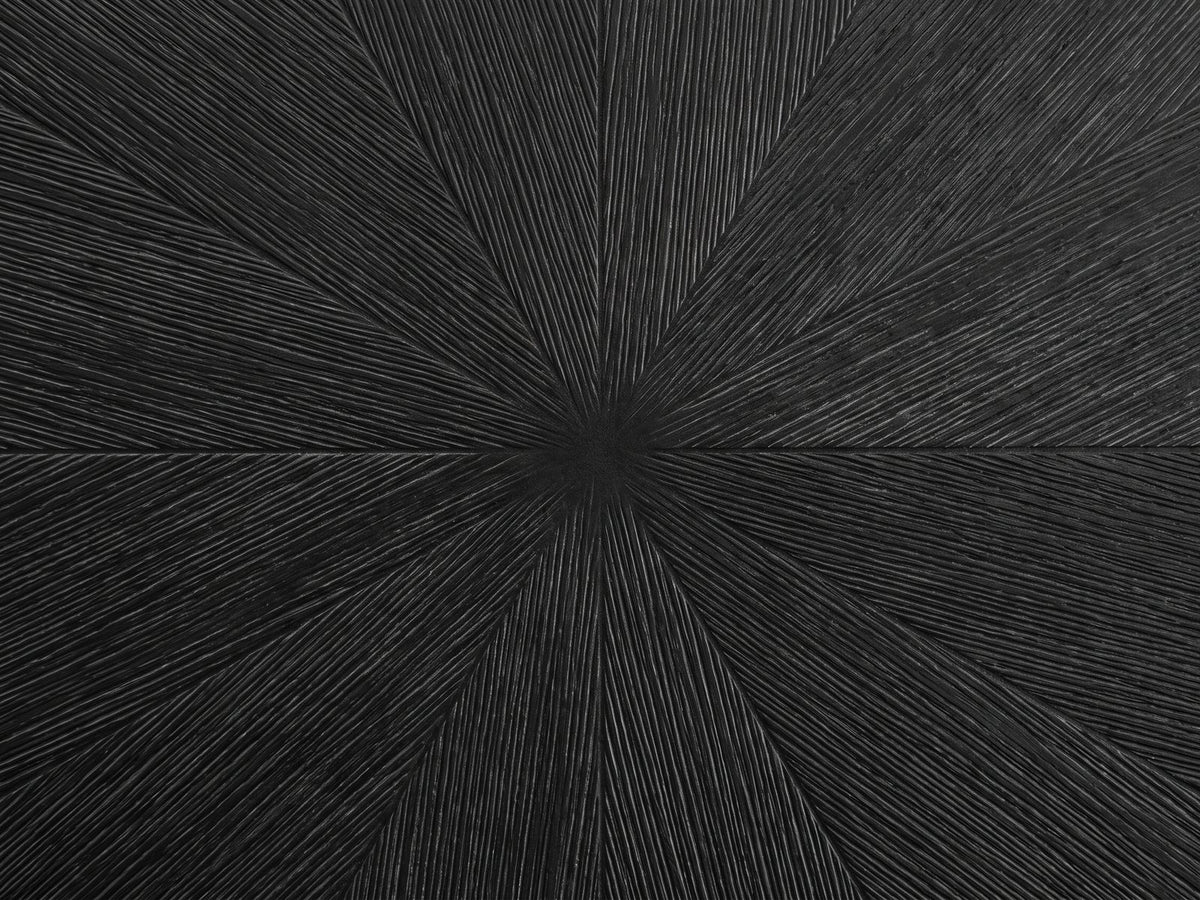 Close-up of the Spilimbergo Black Fiberglass Twisted Petal Pedestal Dining Table: the radial wood-grain relief of the matte black top