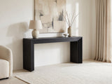Spinazzola Black Paulownia Waterfall Console Table against a plaster wall under an abstract canvas in a bright living room