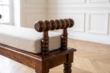 Close-up of the Stefanaconi 39.4-Inch Bobbin-Turned Solid Mango Wood Bench with Cushion: arm