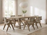 Stilo 84-Inch Weathered Oak Trestle Dining Set with 6 Armchairs in a bright plaster dining room with linen curtains