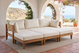 Stromboli acacia daybed set on a terracotta tile loggia in Santa Barbara, California, with white plaster arches, bougainvillea and a view of the sea (rug and plant not included)