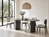 Strongoli 80-Inch Oval Fluted Pedestal Dining Set with 4 Chairs in a sunlit villa dining area with olive trees outside
