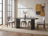 Strongoli 80-Inch Oval Fluted Pedestal Dining Set with 4 Chairs in an industrial loft dining area