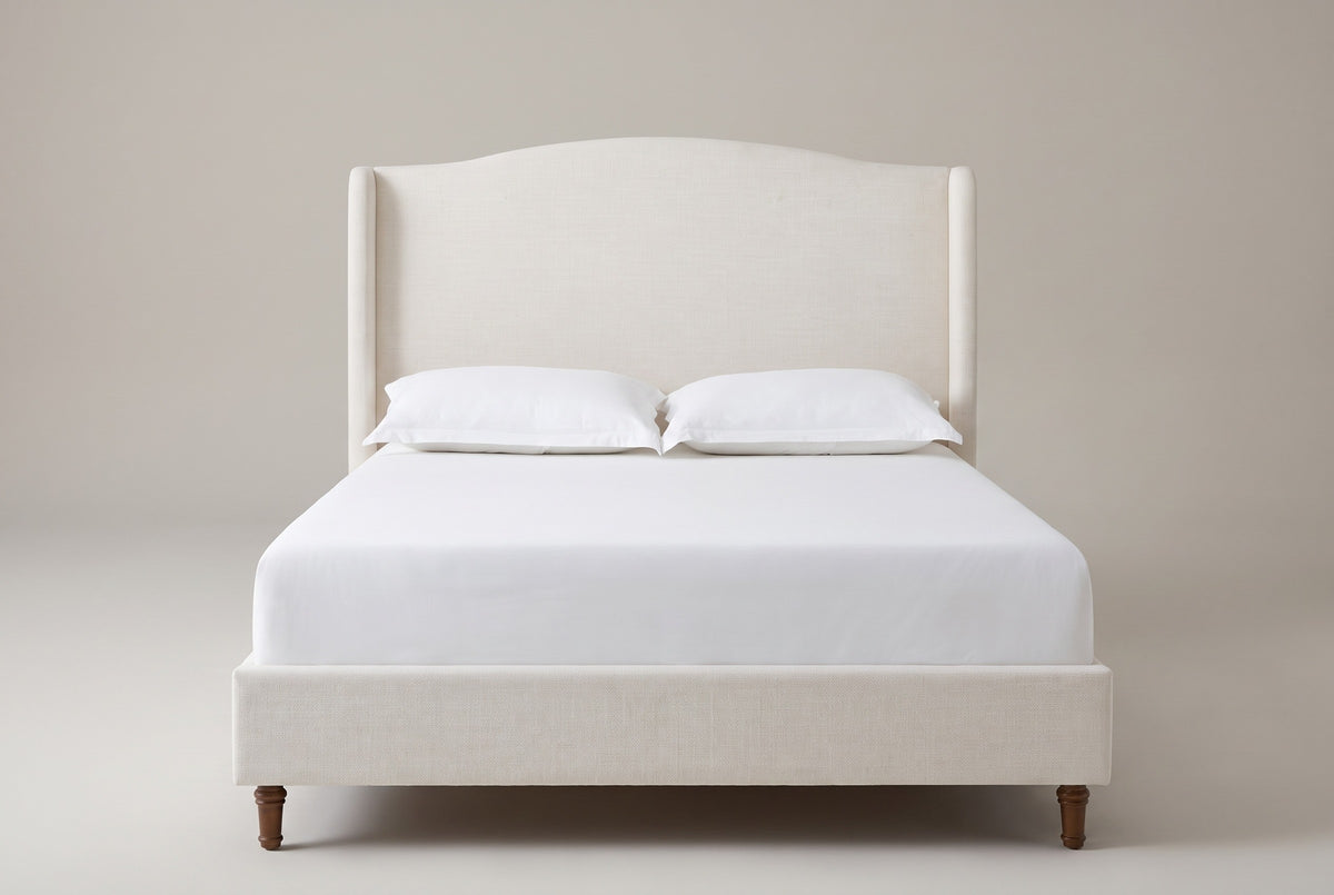 Sulmona bed in ivory textured canvas with a white mattress and pillows (not included), front view
