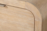 Close-up of the wire-brushed mango veneer on the Tempio nightstand where the top curves down into the side panel