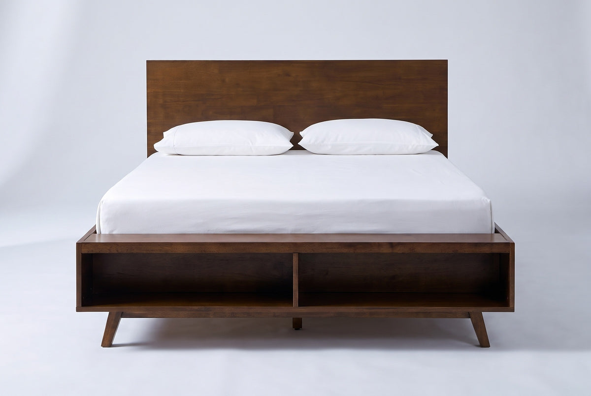 Termoli bed in walnut with a white mattress and pillows (not included), front view showing the two open cubbies