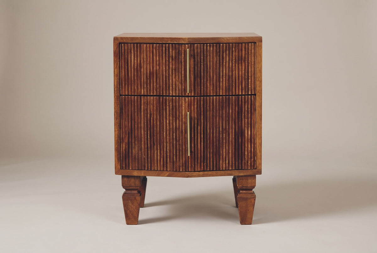 The Teulada nightstand in solid mango with a winewood finish, straight front view on a light studio backdrop