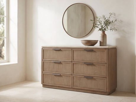 Thiene 66.5-Inch Toffee Oak Stone-Top 6-Drawer Dresser under a round bronze mirror in a villa bedroom