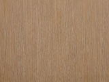 Close-up of the Thiene 66.5-Inch Toffee Oak Stone-Top 6-Drawer Dresser: the cerused toffee oak veneer of a drawer front
