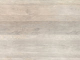 Close-up of the Tolentino Whitewashed Mango Drum Coffee Table: the whitewashed mango grain of the top