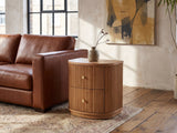 Tolfa Fluted Beech Half-Moon Side Table beside a leather sofa in an industrial loft