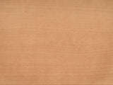 Close-up of the Tolfa Fluted Beech Half-Moon Side Table: the natural beech grain of the top