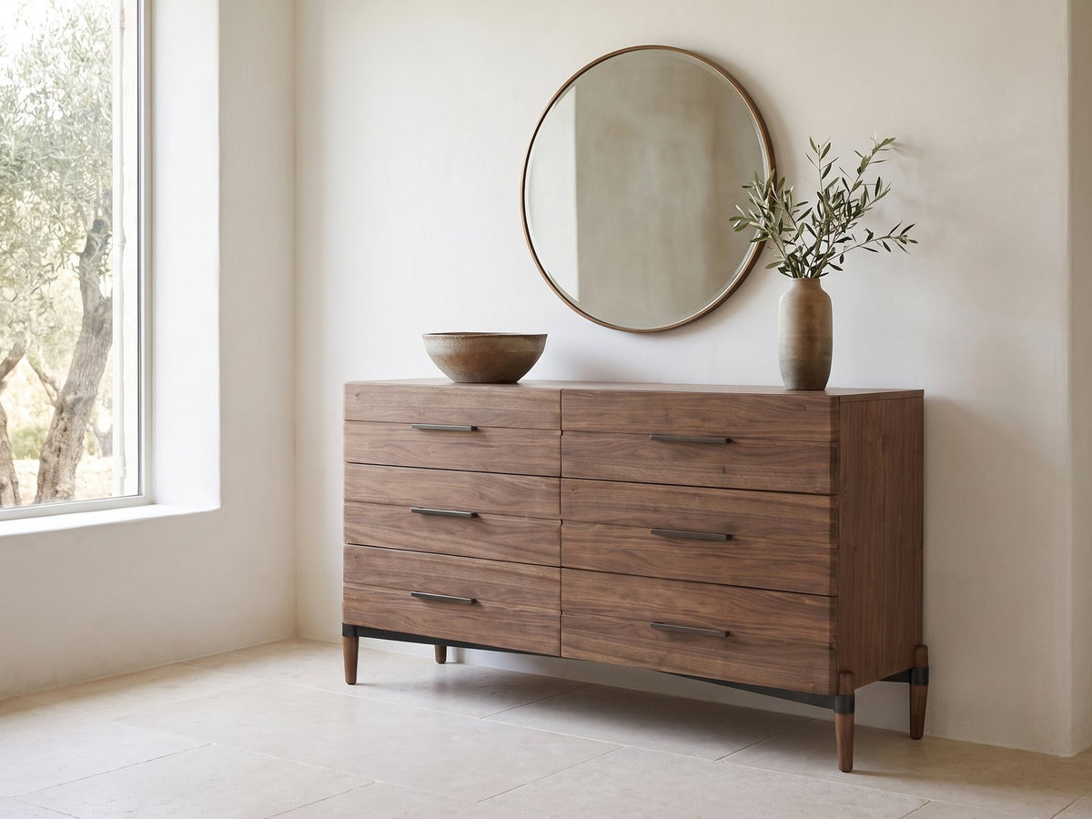 Torcello 68-Inch Walnut 6-Drawer Dresser under a round bronze mirror in a villa bedroom