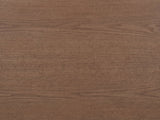 Close-up of the Tortona 47-Inch Oval Walnut-Finish Wood Veneer Coffee Table: the walnut-finish wood veneer grain of the top