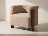 Trevi Wood Plank Barrel Chair in taupe against a plaster wall in morning light