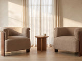 The Trevi barrel chair styled in a room setting