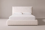 Trivento cream white chenille bed with a white mattress and pillows (not included), front view