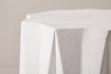 Close-up of the antique white lightweight concrete on the Troina side table, a star point and the crease below it