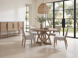 Tropea 54-Inch Round Extending Mindi Veneer Dining Set with 4 Chairs and Server in a sunlit villa dining area with olive trees outside